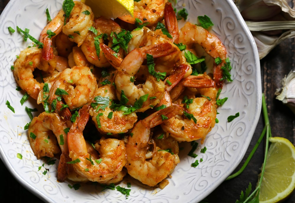 Garlic Butter Shrimp garnished with chopped parsley